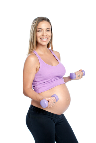 pregnant woman lifting weights