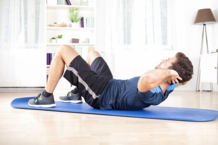 man exercising at home