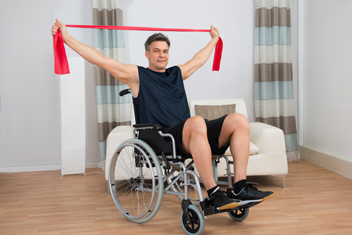 man in wheelchair training