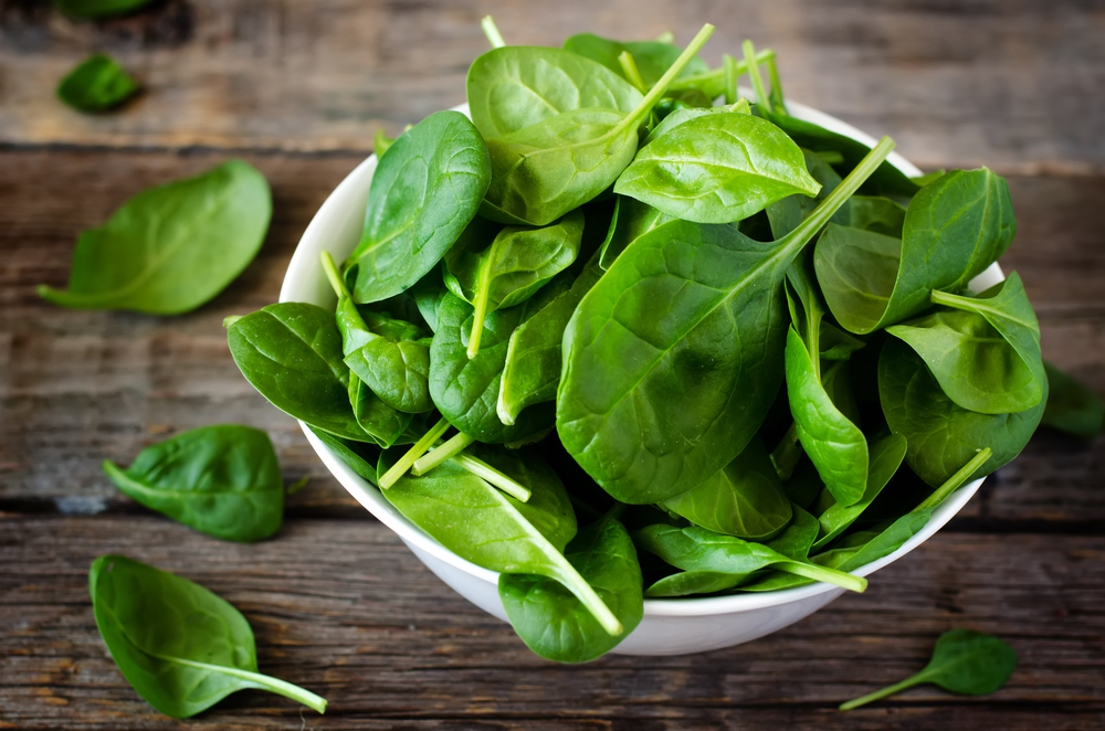 Bowl of raw baby spinach