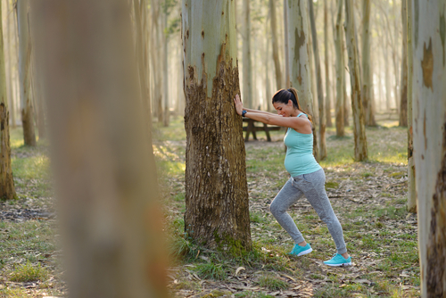 woman stretching calf